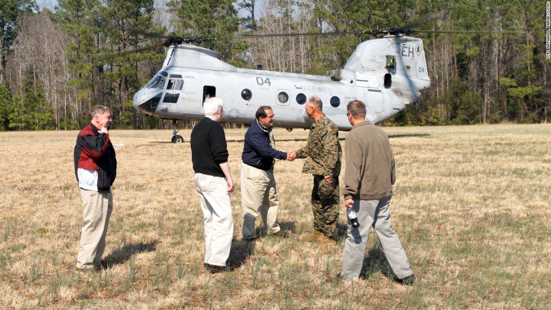 Scalia shakes hands with  U.S. Marines Corps  Maj. Gen. Robert C. Dickerson, commanding general, upon Scalia&#39;s arrival at Marine Corps Base Camp Lejeune, North Carolina, for an official visit on March 12, 2004. 