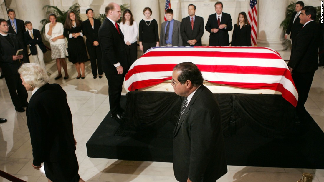 The casket of Chief Justice William H. Rehnquist lies in the Great Hall of the U.S. Supreme Court as  Scalia and Sandra Day O&#39;Connor, left, walk past on September 6, 2005, in Washington.