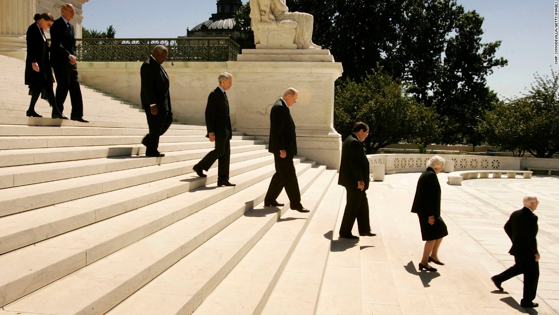  Members of the U.S. Supreme Court, Justice Ruth Bader Ginsburg, Justice Stephen Breyer, Justice Clarence Thomas, Justice David Souter, Justice William Kennedy, Justice Antonin Scalia, Justice Sandra Day O&#39;Connor and Justice John Paul Stevens file out of the U.S. Supreme Court Building to attend funeral services for Chief Justice William Rehnquist on September 7, 2005, in Washington.