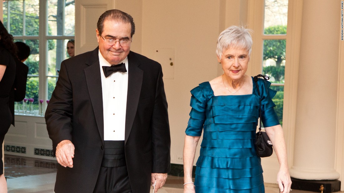Scalia and  his wife, Maureen, arrive for a state dinner in honor of British Prime Minister David Cameron at the White House on March 14, 2012, in Washington.