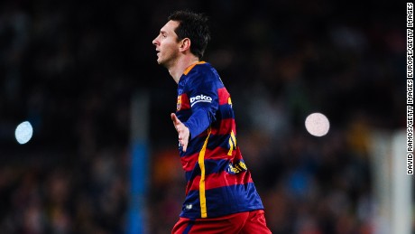 Messi celebrates after putting Barcelona ahead in the Nou Camp with a superb free kick.