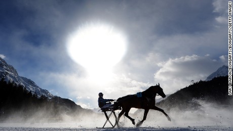 The frozen lake is checked meticulously to ensure it remains thick enough.