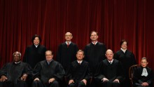 WASHINGTON - OCTOBER 08:  U.S. Supreme Court members (first row L-R) Associate Justice Clarence Thomas, Associate Justice Antonin Scalia, Chief Justice John Roberts, Associate Justice Anthony Kennedy, Associate Justice Ruth Bader Ginsburg, (back row L-R) Associate Justice Sonia Sotomayor, Associate Justice Stephen Breyer, Associate Justice Samuel Alito and Associate Justice Elena Kagan pose for photographs in the East Conference Room at the Supreme Court building October 8, 2010 in Washington, DC. This is the first time in history that three women are simultaneously serving on the court.  (Photo by Chip Somodevilla/Getty Images)