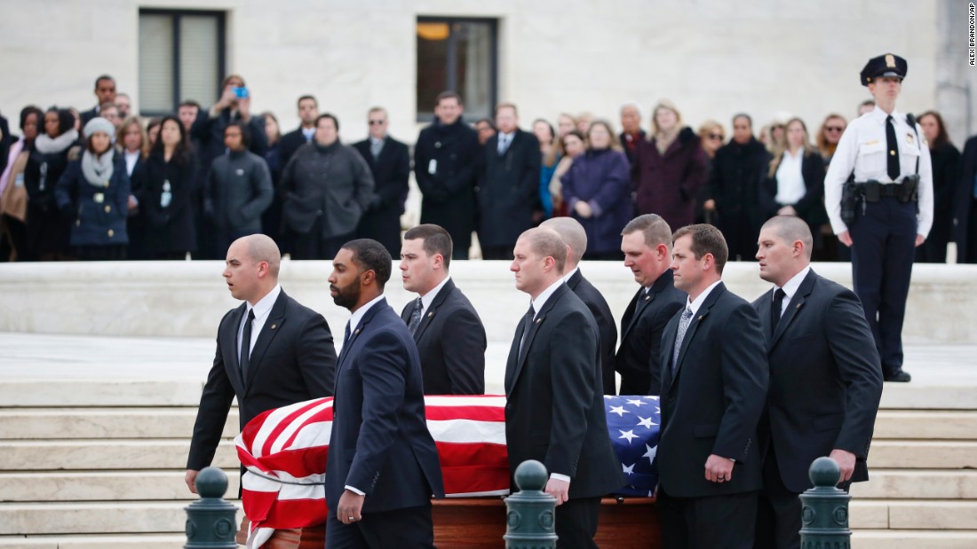 Pallbearers carry Scalia&#39;s casket on February 19.