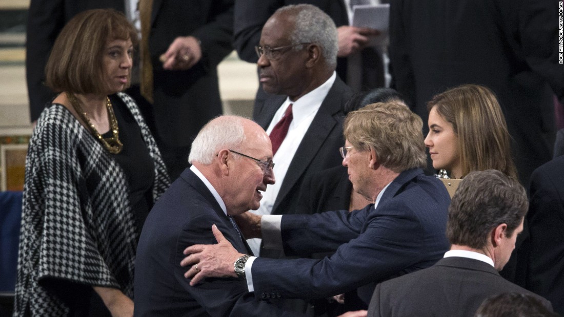 Former Vice President Dick Cheney, left, and Supreme Court Justice Clarence Thomas take their seats for the funeral Mass on February 20. 