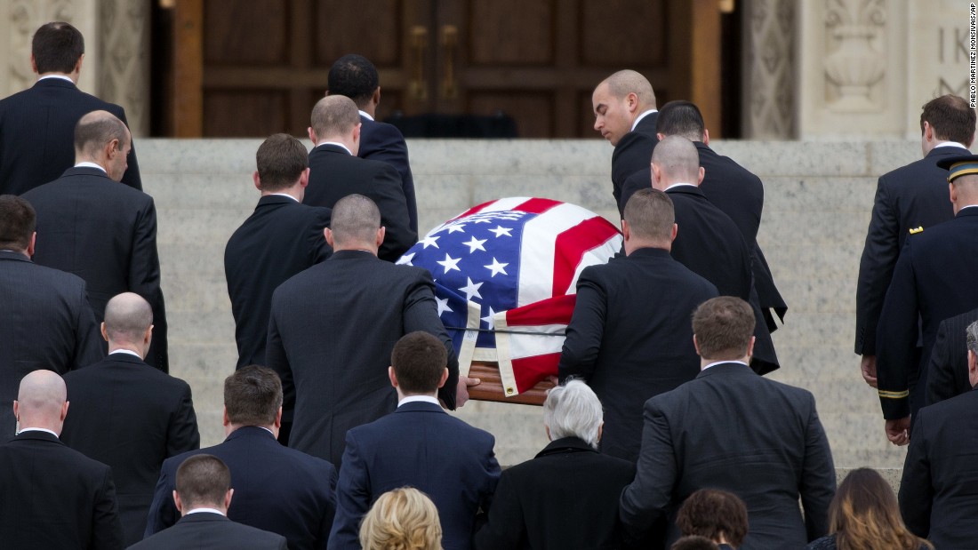 The casket containing Scalia&#39;s body arrives at the Basilica of the National Shrine of the Immaculate Conception.