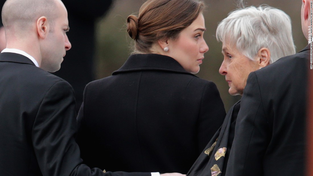 Maureen Scalia, right, arrives for the funeral for her husband on February 20. 