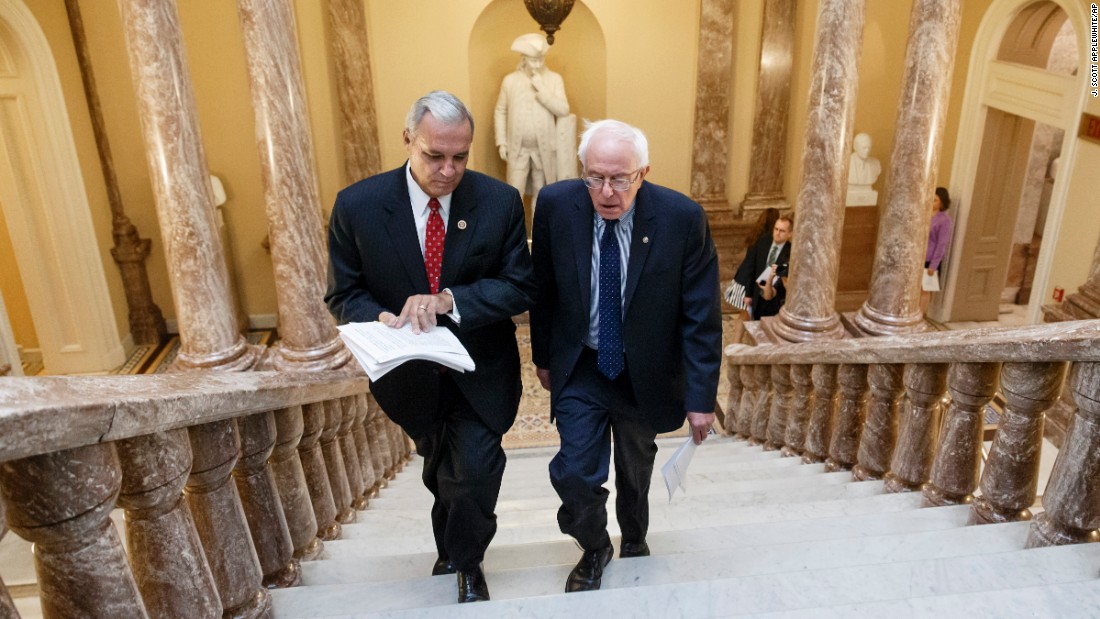 Sanders and US Rep. Jeff Miller, chairman of the House Committee on Veterans&#39; Affairs, walk to a news conference on Capitol Hill in 2014. Sanders was chairman of the Senate Committee on Veterans&#39; Affairs.