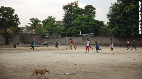 Children play soccer in a dirt lot in Ouanaminthe, Haiti.