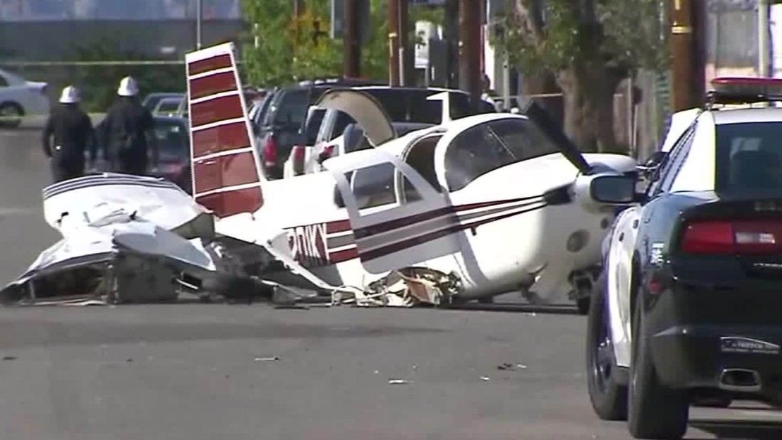 Plane's crash landing in street caught on camera - CNN Video