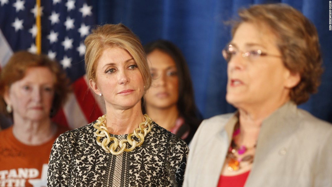 Meanwhile, Wendy Davis&#39; 2013 filibuster propelled her to the Democratic Party&#39;s nomination for Texas governor. Here, she listens as Houston City Council member Ellen Cohen speaks about the law in October 2014, just weeks before Davis was defeated by Republican Greg Abbott.