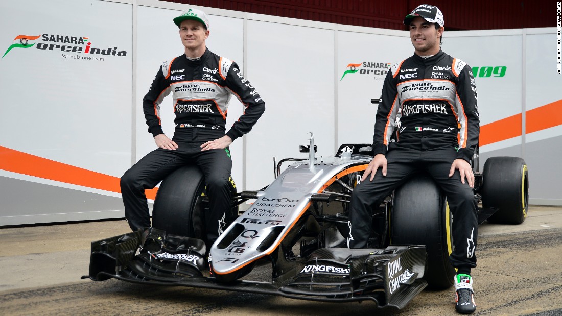 Force India&#39;s Nico Hulkenberg (left) and Sergio Perez (right) find a new use for the VJM09 car as it is unveiled in winter testing. Let&#39;s just hope those tires are super-soft and not hard to sit on.