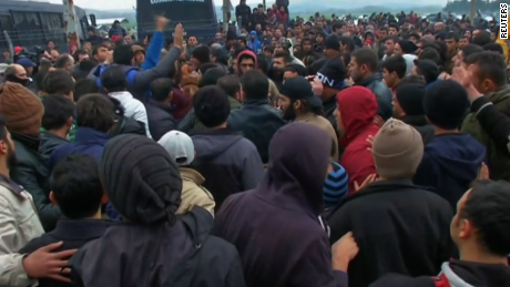 Migrants storm Greek-Macedonian border fence
