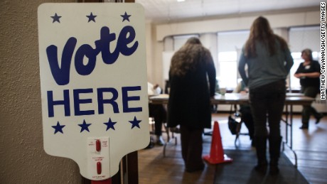 SHELBURNE, MA - MARCH 01: Voters check in before casting their ballots in the Shelburne Town Hall on March 01, 2016 in Shelburne, Massachusetts. Officials are expecting a record turnout of voters in Massachusetts, one of a dozen states holding Super Tuesday presidential primaries or caucuses. (Photo by Matthew Cavanaugh/Getty Images)