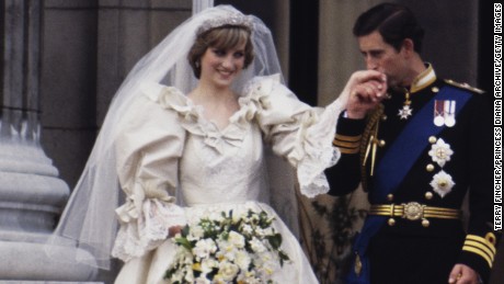 The Prince and Princess of Wales on the balcony of Buckingham Palace on their wedding day, 29th July 1981. She wears a wedding dress by David and Elizabeth Emmanuel and the Spencer family tiara. (Photo by Terry Fincher/Princess Diana Archive/Getty Images)
Diana Spencer, 20 - Prince Charles, 33
