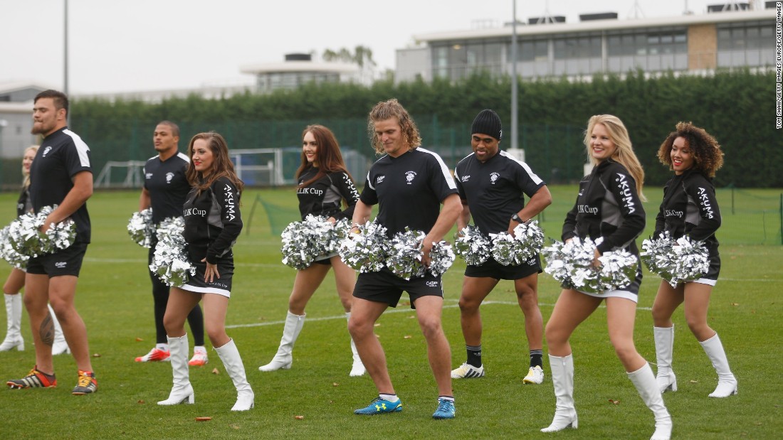 But the wing is as well known for his colorful antics -- here doing a spot of cheerleader -- as he is for his rugby.