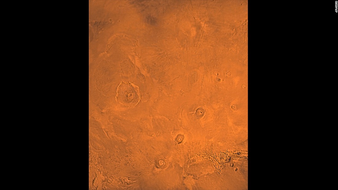 This image shows the Tharsis Bulge, a huge ridge on Mars covered by three large volcanoes (from lower left to right): Arsia, Pavonis and Ascraeus Mons. To the left is the huge Olympus Mons volcano.