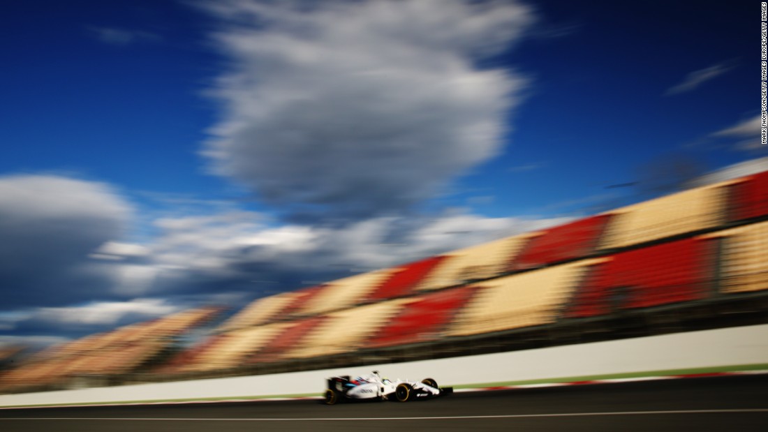 Felipe Massa of Williams speeds by the empty grandstand on day three of the second week of testing. The Brazilian finished second fastest on Thursday with a time of 1:23.192.