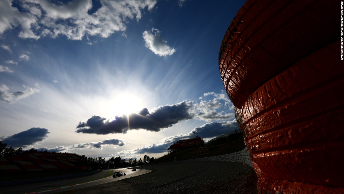 Sauber&#39;s Marcus Ericsson and McLaren&#39;s Jenson Button cruise around the Circuit de Catalunya on March 2. 