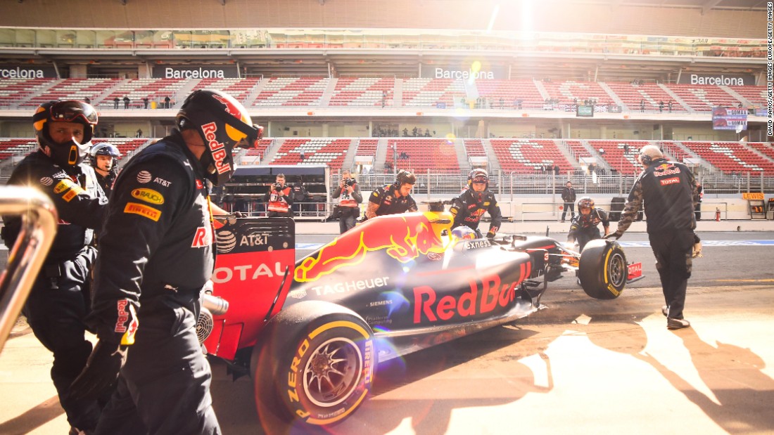 Daniel Ricciardo of Red Bull Racing is pushed back into the garage during day two of  testing.