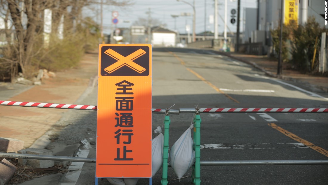 A road block marks the entrance to the Fukushima exclusion zone.