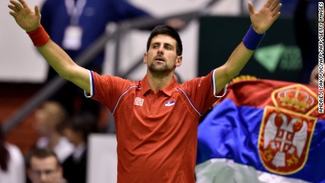 An exhausted Novak Djokovic reacts after beating Kazakhstan&#39;s Mikhail Kukushkin in a marathon five-set Davis Cup rubber in Belgrade.