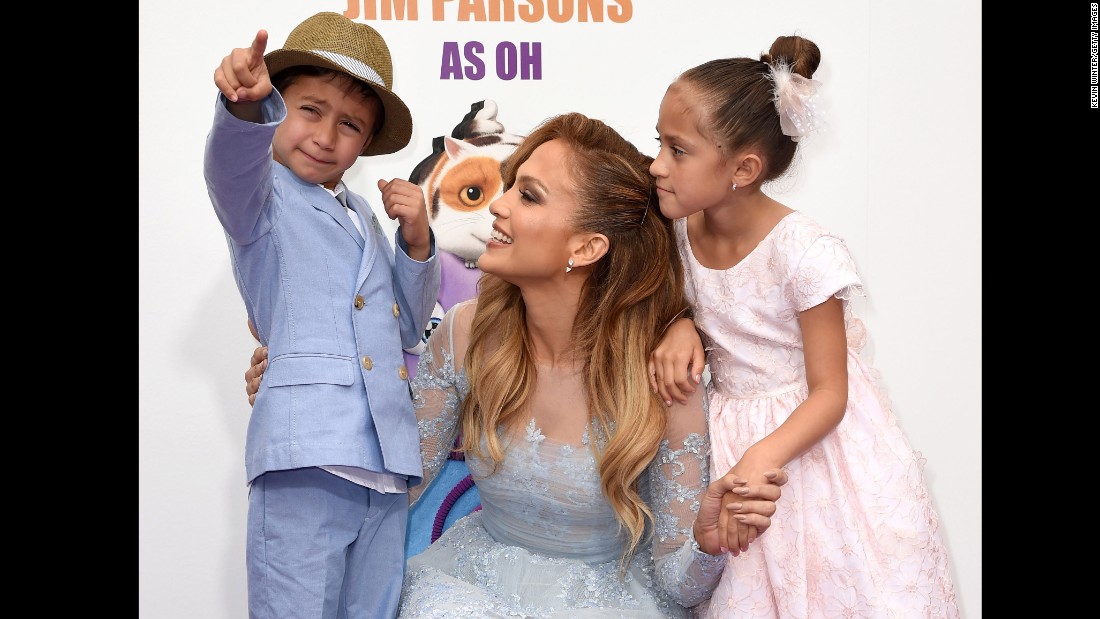 Jennifer Lopez, son Max and daughter Emme attend the premiere of &quot;Home&quot; last year. The singer is proud her twins are bilingual thanks to her nanny who speaks to them in Spanish.