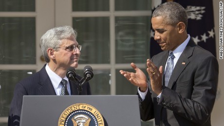 Federal appeals court judge Merrick Garland, stands with President Barack Obama as he is introduced as Obama&#39;s nominee for the Supreme Court during an announcement in the Rose Garden of the White House, in Washington, Wednesday, March 16.