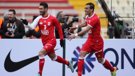Tractorsazi&#39;s Shoja Khalilzadeh (L) celebrates with his teammate Bakhtiar Rahmani after scoring a goal during their AFC Champions League match against UAE&#39;s al-Jazira in Tabriz in February 2016.