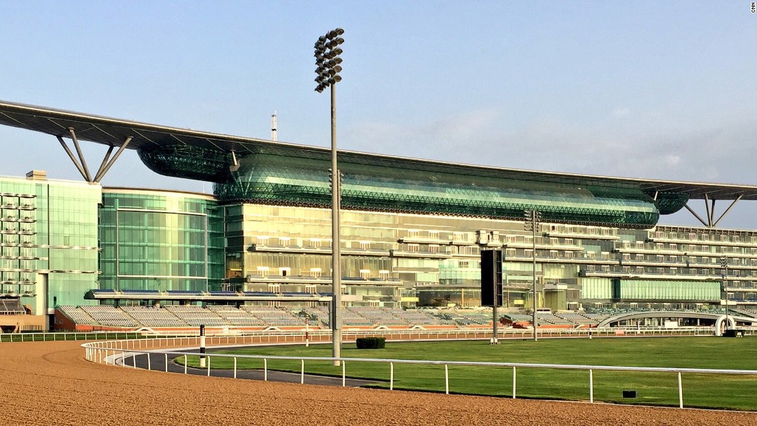 The majestic Meydan racecourse at sunrise -- the coolest time of day for the horses to work on the track. 
