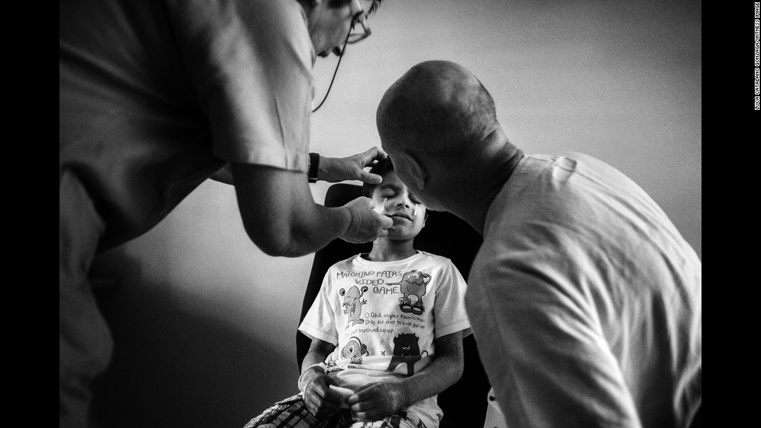 Alex undergoes an eye exam at a hospital in Trieste, Italy. Alex has an ulcerated cornea and suffers from photophobia, meaning that he is incredibly sensitive to light and it can have a painful, blinding effect on him. He&#39;s already losing his eyesight.
