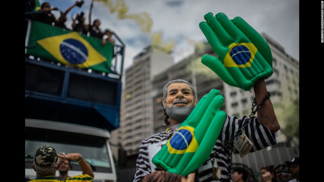 A demonstrator is dressed as Lula Da Silva during a protest in Rio de Janeiro on Sunday, March 13.