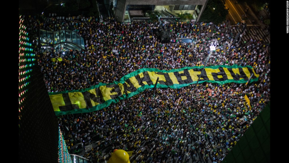 An impeachment sign is carried in Sao Paulo on March 16.