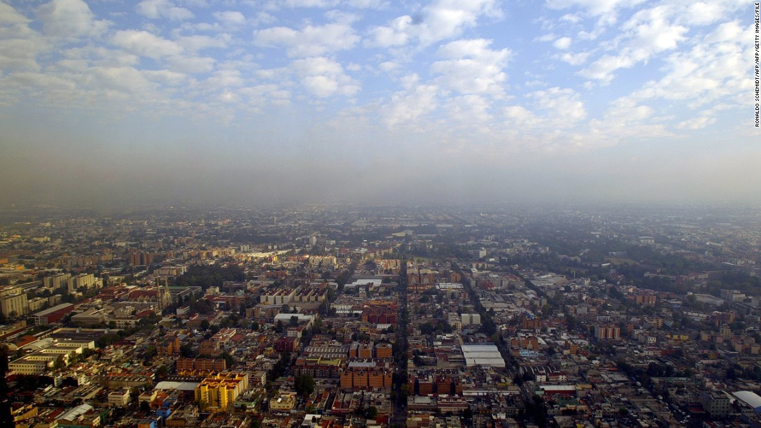 An aerial view of Mexico City taken in 2007. It&#39;s morning, but already a layer of smog hovers over the metropolis.