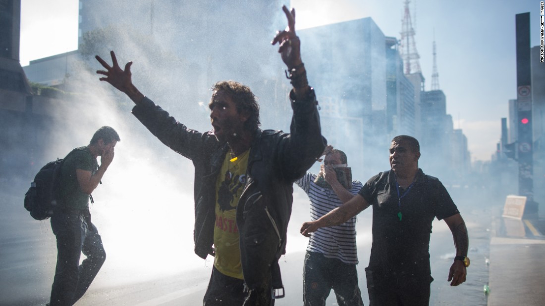 Police use water cannons on Sao Paulo protesters on March 18. Many Brazilians are also frustrated &lt;a href=&quot;http://money.cnn.com/2016/03/17/news/economy/brazil-rousseff-lula-economy/&quot; target=&quot;_blank&quot;&gt;with a spiraling economy.&lt;/a&gt;