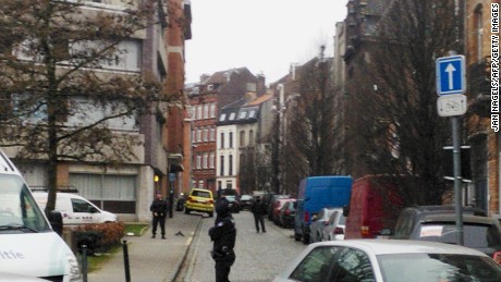 Belgian policemen stand guard the road during a police action in the Molenbeek-Saint-Jean district in Brussels, on March 18, 2016.
A police operation was underway on March 18, in the Brussels area home to key Paris attacks suspect Salah Abdeslam whose fingerprints were found in an apartment raided this week, the federal prosecutor&#39;s office said.  / AFP PHOTO / BELGA / JAN NAGELS / Belgium OUTJAN NAGELS/AFP/Getty Images