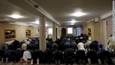 Members of Molenbeek&#39;s Muslim community attend Friday prayers at Attadamoun Mosque.