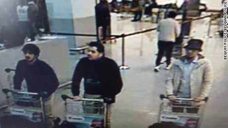 Police say they are looking for the man on the right in connection with the Brussels attack.