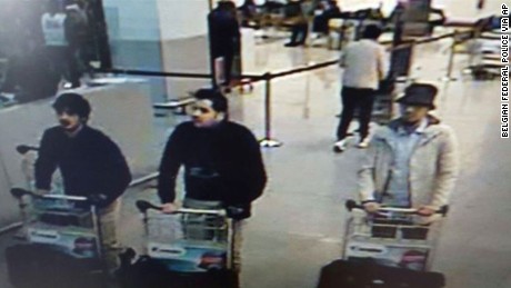 In this image provided by the Belgian Federal Police in Brussels on Tuesday, March 22, 2016 of three men who are suspected of taking part in the attacks at Belgium&#39;s Zaventem Airport. The man at right is still being sought by the police and two others in the photo that the police issued were according to a the Belgian Prosecutors &#39;probably&#39; suicide bombers. Bombs exploded at the Brussels airport and one of the city&#39;s metro stations Tuesday, killing and wounding scores of people, as a European capital was again locked down amid heightened security threats. (Belgian Federal Police via AP)