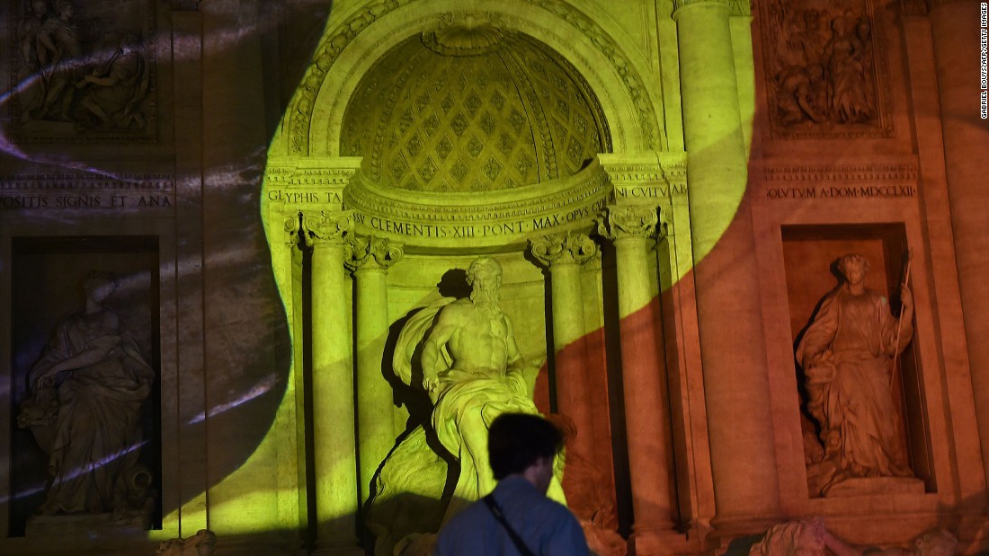 An image of the Belgian flag is displayed on the Trevi Fountain in Rome on March 22.