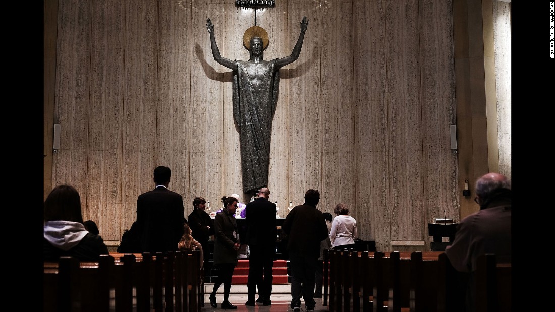 A New York City church holds Mass for victims of the Brussels attacks on March 22.