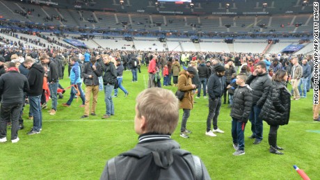 Spectators at the Stade de France stadium after the Paris terror attacks in November 2015.