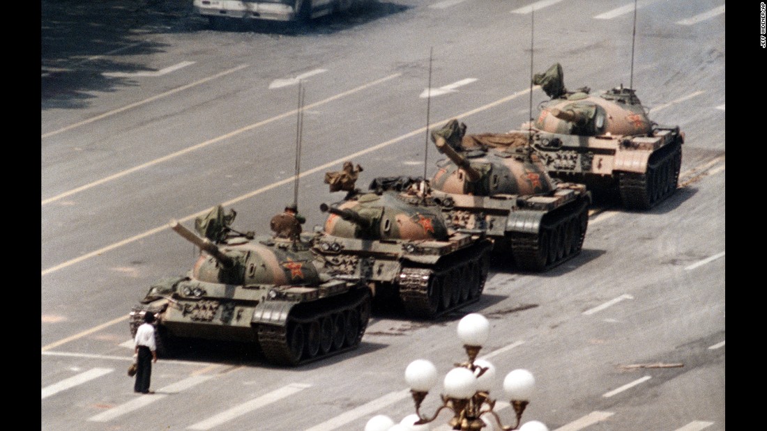 &lt;strong&gt;Tiananmen massacre: &lt;/strong&gt;In this iconic photo from Beijing&#39;s Tiananmen Square, an unidentified man stands alone on Cangan Boulevard, blocking the advance of military tanks on June 5, 1989. Anywhere from hundreds to thousands of people died the day before when Chinese &lt;a href=&quot;http://www.cnn.com/2013/09/15/world/asia/tiananmen-square-fast-facts/&quot; target=&quot;_blank&quot;&gt;troops fired on civilians&lt;/a&gt; who were participating in peaceful anti-government protests in the square. The demonstrations, initiated by students seeking democratic reform and an end to government corruption, also led to thousands of arrests and several dozen executions. Tiananmen, ironically, means &quot;Gate of Heavenly Peace.&quot;