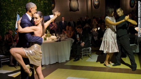 President Barack Obama and first lady Michelle Obama dance the tango with tango dancers during the State Dinner at the Centro Cultural Kirchner, Wednesday, March 23, 2016, in Buenos Aires, Argentina.