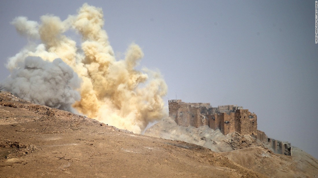 A dust cloud rises near the Palmyra Castle during the military operation to retake Palmyra on March 25.