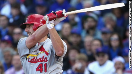 John Lackey of the St. Louis Cardinals breaks his bat as he hits a single in the second inning against the Chicago Cubs during game four of the National League Division Series on October 13, 2015 in Chicago, Illinois