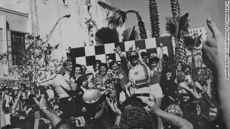 Happy days! Mario Andretti celebrates his win at the 1977 United States GP West at Long Beach. 