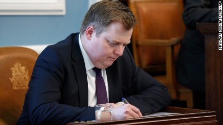 Iceland&#39;s Prime Minister Sigmundur David Gunnlaugsson, writes during a parliamentary session in Reykjavik on Monday April 4, 2016. Iceland&#39;s prime minister insisted Monday he would not resign after documents leaked in a media investigation allegedly link him to an offshore company that would represent a serious conflict of interest, according to information leaked from a Panamanian law firm at the center of an international tax evasion scheme. (AP Photo/Brynjar Gunnarsson)
