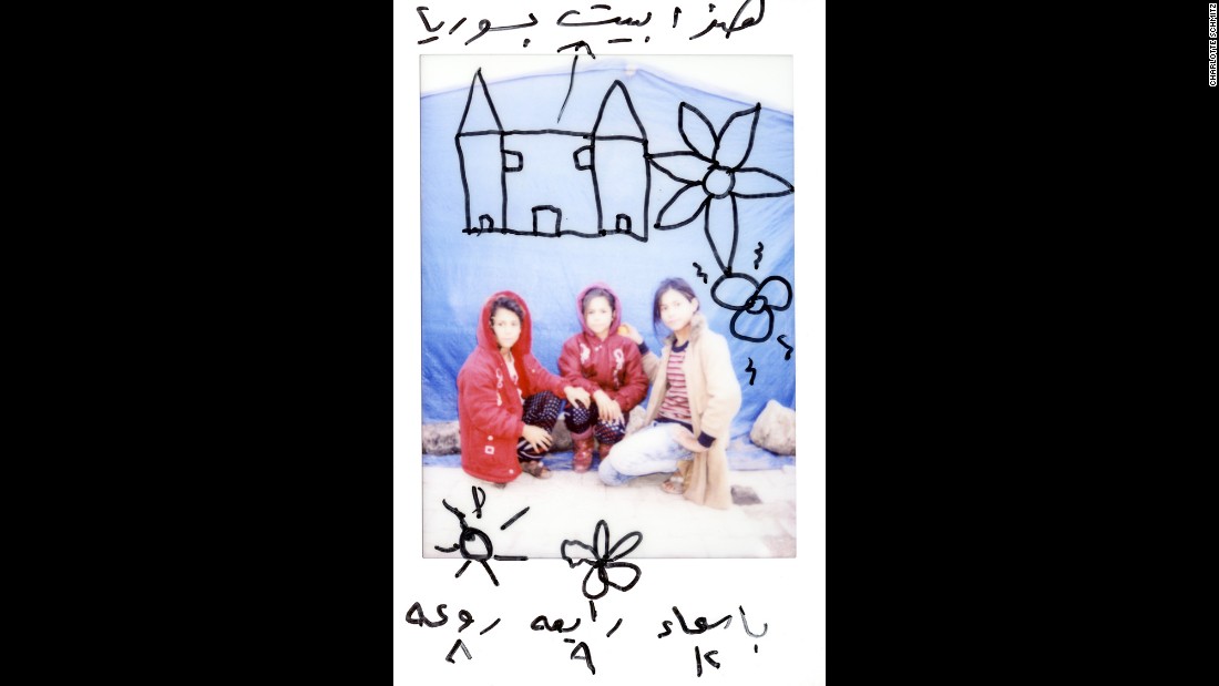 There are drawings on this Polaroid of Asmaa, 12; Rabea, 9; and Raoah, 8. &quot;This is our house in Syria,&quot; it says on top.