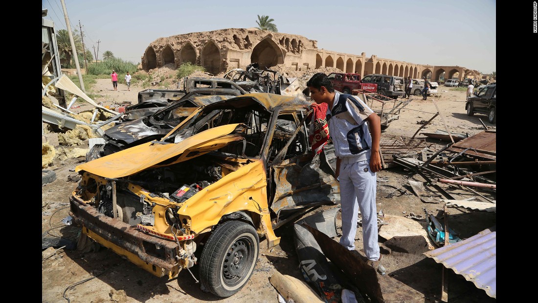 A man inspects the aftermath of a car bombing in Khan Bani Saad, Iraq, on July 18, 2015. &lt;a href=&quot;http://www.cnn.com/2015/07/18/middleeast/iraq-violence/&quot; target=&quot;_blank&quot;&gt;A suicide bomber with an ice truck,&lt;/a&gt; promising cheap relief from the scorching summer heat, lured more than 100 people to their deaths. ISIS claimed responsibility on Twitter.